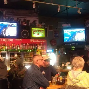 people sitting at the bar