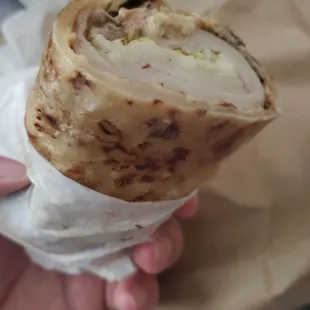 Turkey wrap with provolone and jalapeños.