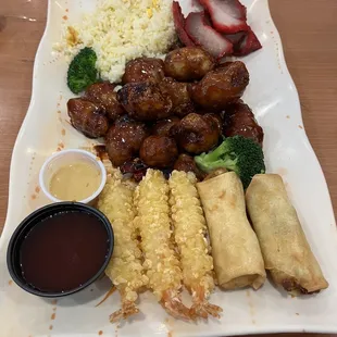 General TSO&apos;s chicken, shrimp, spring rolls BBQ pork and rice. Also comes with soup.