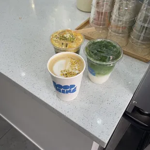 pistachio einspanner, osmanthus tea latte, matcha latte