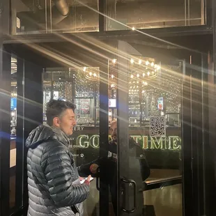 a man opening the door