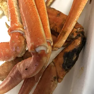 Old seafood that had black spots on the crab legs