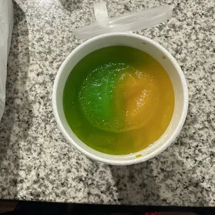 a bowl of soup and a spoon