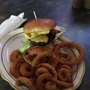 Bacon cheeseburger w/ onion rings.  Delicious burger.  Onion rings were over done.