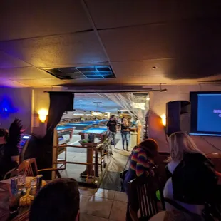 a crowd of people at a bar