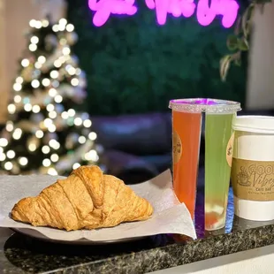 Buttered croissant, split drink and hot latte!