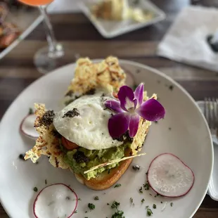 Avocado toast with over easy egg