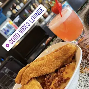 a plate of food and a drink