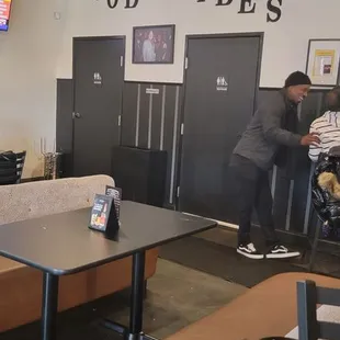 a man playing ping - pong