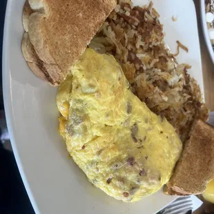 3-meat omelette with hash-browns and wheat toast