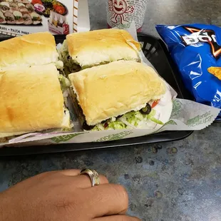 a sandwich and chips