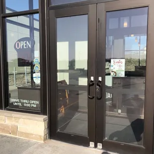 a shadow of a person standing in front of a closed door