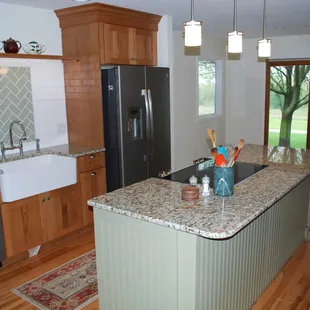 a kitchen with granite counter tops