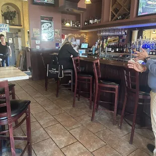 The bartender who walked away from me and her friend who threatened me