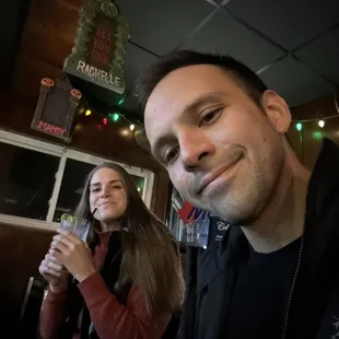 a man and a woman sitting at a table