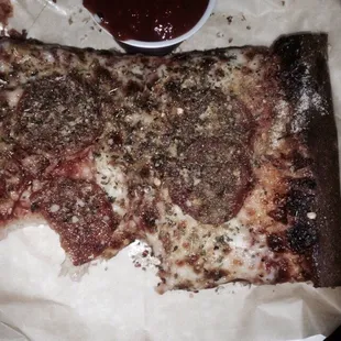 &quot;Pizza&quot; slice that I added herbs and my own garlic salt to. Not enough sauce or cheese on it.