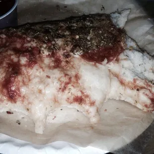 Doughy bread with hardly any cheese or sauce.