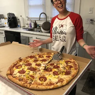 22" pizza with pepperoni, garlic sausage crumble, and banana yellow peppers