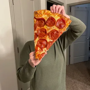 A single slice of the 22 inch pizza!