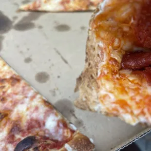 Extra close photo I didn't know if I was eating the box or the pizza