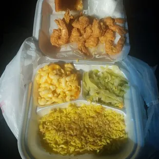 Mac N Cheese, cabbage, cornbread, rice n gravy, huge fried shrimp! All for just $10!