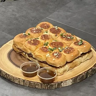 Slow cooked beef/ lamb sliders. You can't/wont be able to stop inhaling these down.