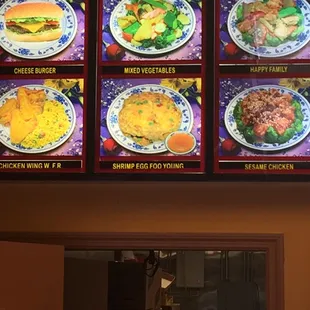 a menu on a wall in a restaurant