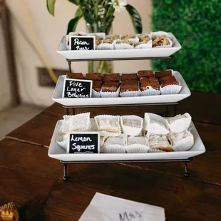 Various desserts. All were delicious, but the five-layer brownie was a guest favorite.