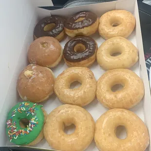 a variety of donuts in a box