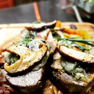 Bacon wrapped elk tenderloin, with shiitake mushrooms