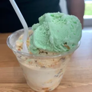 Two scoops of butter crunch and a scoop of pistachio almond