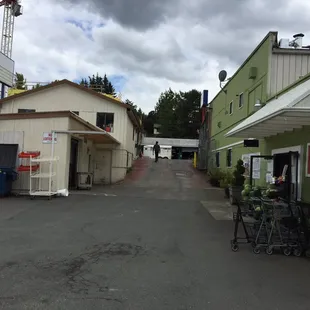 This is looking up at the driveway you drive down to get here. That&apos;s the street at the top and the shop is on the right.