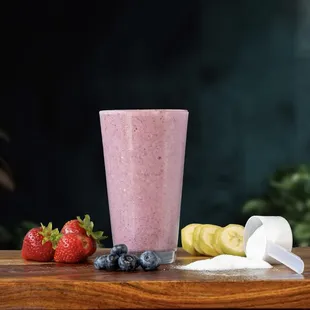 strawberries, bananas, and blueberries