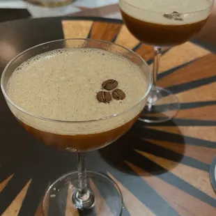 two cocktails on a table