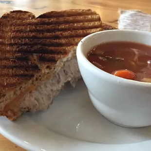 a sandwich and a bowl of soup