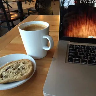 Americano and chocolate chip cookie.