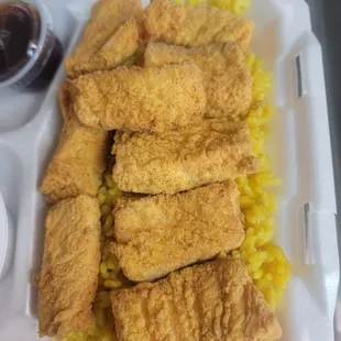 Fried Salmon over yellow rice