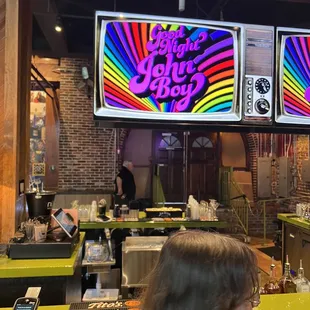 a neon sign in a restaurant