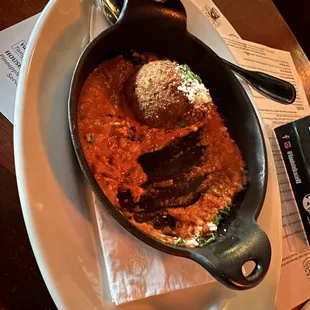 Arancini with risotto. Very filling. Only 8$ happy hour 4-6 pm on Saturdays as well!