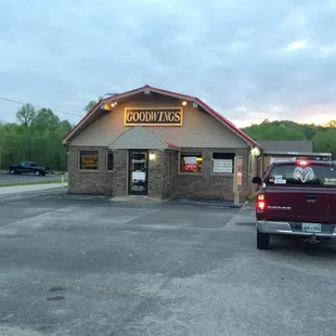 a truck parked in front of a building