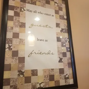 a picture of a framed picture of a quote