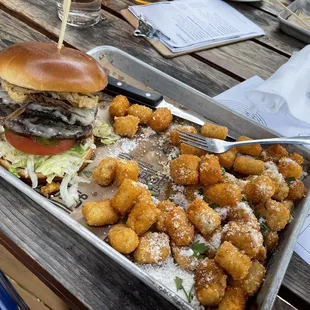a burger and tater tots