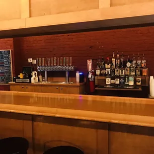 a bar with a lot of bottles