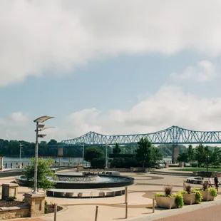 a view of a bridge and a fountain