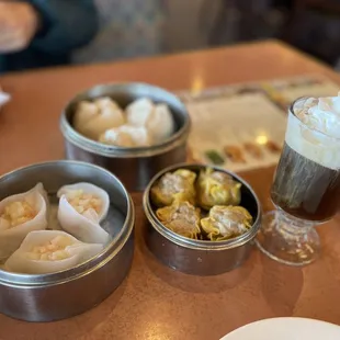 three containers of food on a table