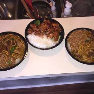 Roast pork lo mein, sesame chicken, and beef lo mein.