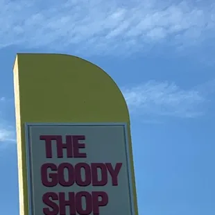 a sign for the goody shop