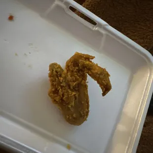 fried chicken in a styrofoam container