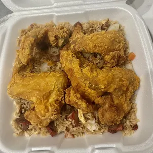 chicken and rice in a styrofoam container
