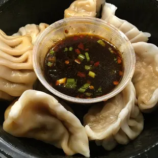 Steamed dumplings are hand rolled.